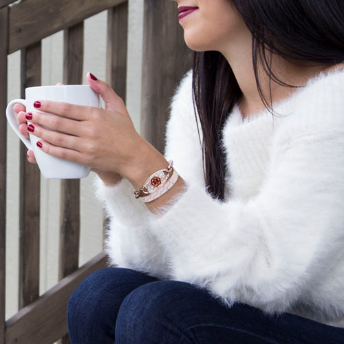 Anxiety bracelet with filigree Tag and woman enjoying coffee