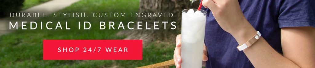 Woman wearing silicone and rose gold ICE ID bracelet